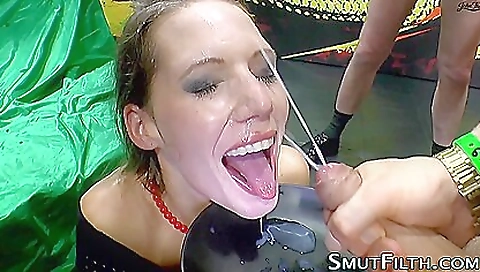 Petite brunette gets a facial from a hot gangbanged slut