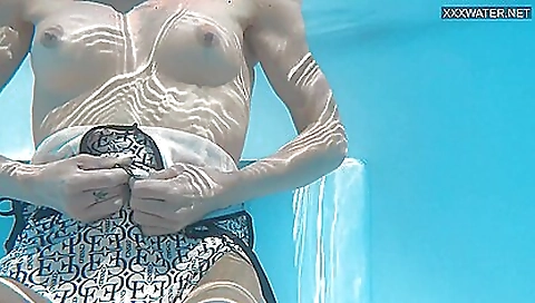 Skyy brunette swimmer zazie skym swims nude in the water