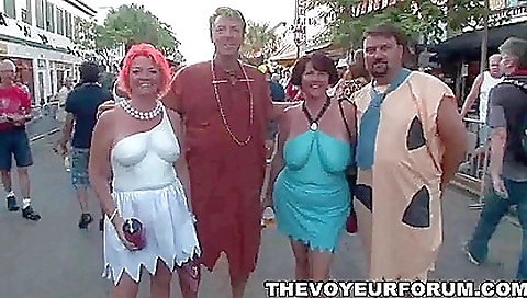 Two hot blonde girls with big tits are having a group sex