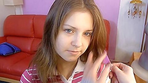 A brunette teen with a nice body is getting her panties off