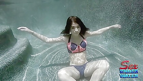 A petite teen is training on a huge dildo outdoors