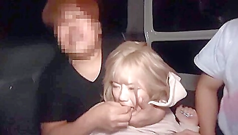 Asian blonde and her friend are having a threesome on a car