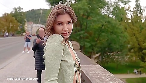 Brunette girl with a nice body shows off her body to us