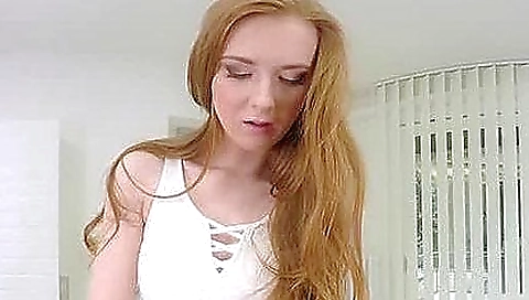 Redhead with two toys enjoys a solo female porn clip