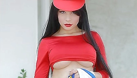 Sexy girl in pink dress shows a dildo in a solo porn scene