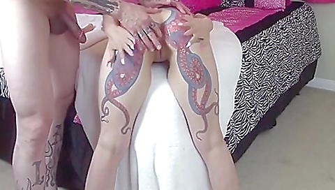 Tattooed babe in a sexy black dress gets her ass fucked