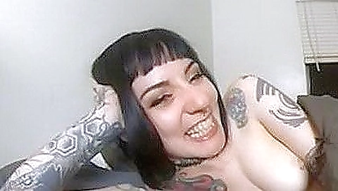 Hot brunette is fingering her wet vaginal hole on screen